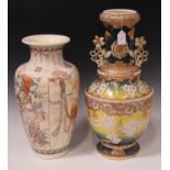 A Japanese Satsuma earthenware vase, Meiji period, painted and gilt with blossom on a yellow and