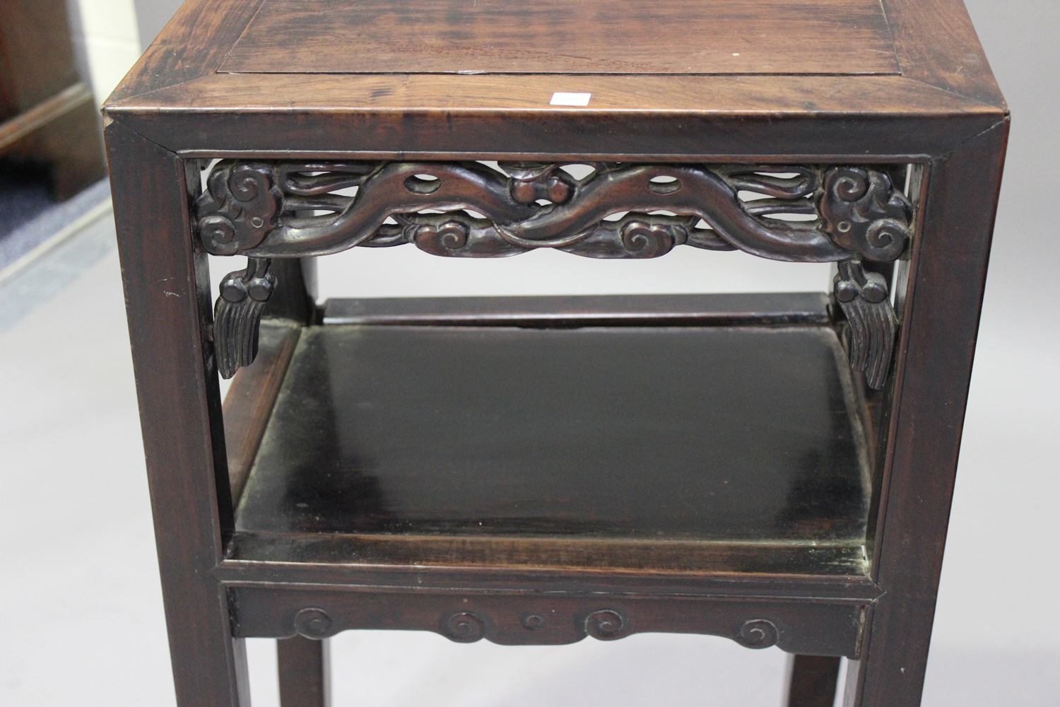 A pair of Chinese hardwood two-tier stands, late 19th century, each rectangular panelled top above a - Image 5 of 8