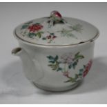 A Chinese famille rose porcelain teapot and cover, Republic period, of circular form, the cover with