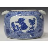 A Japanese blue and white porcelain jar, Meiji period, of compressed circular form with moulded