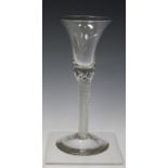 An airtwist stem wine glass, mid-18th century, the bell shaped bowl raised on a multi-series