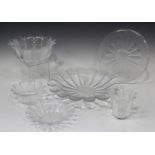 A collection of Dartington Daisy pattern glass tablewares, comprising two large serving dishes,