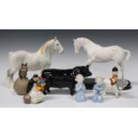 A Beswick Shire Mare in gloss grey, model No. 818, a Royal Doulton white glazed 'Spirit of Youth', a