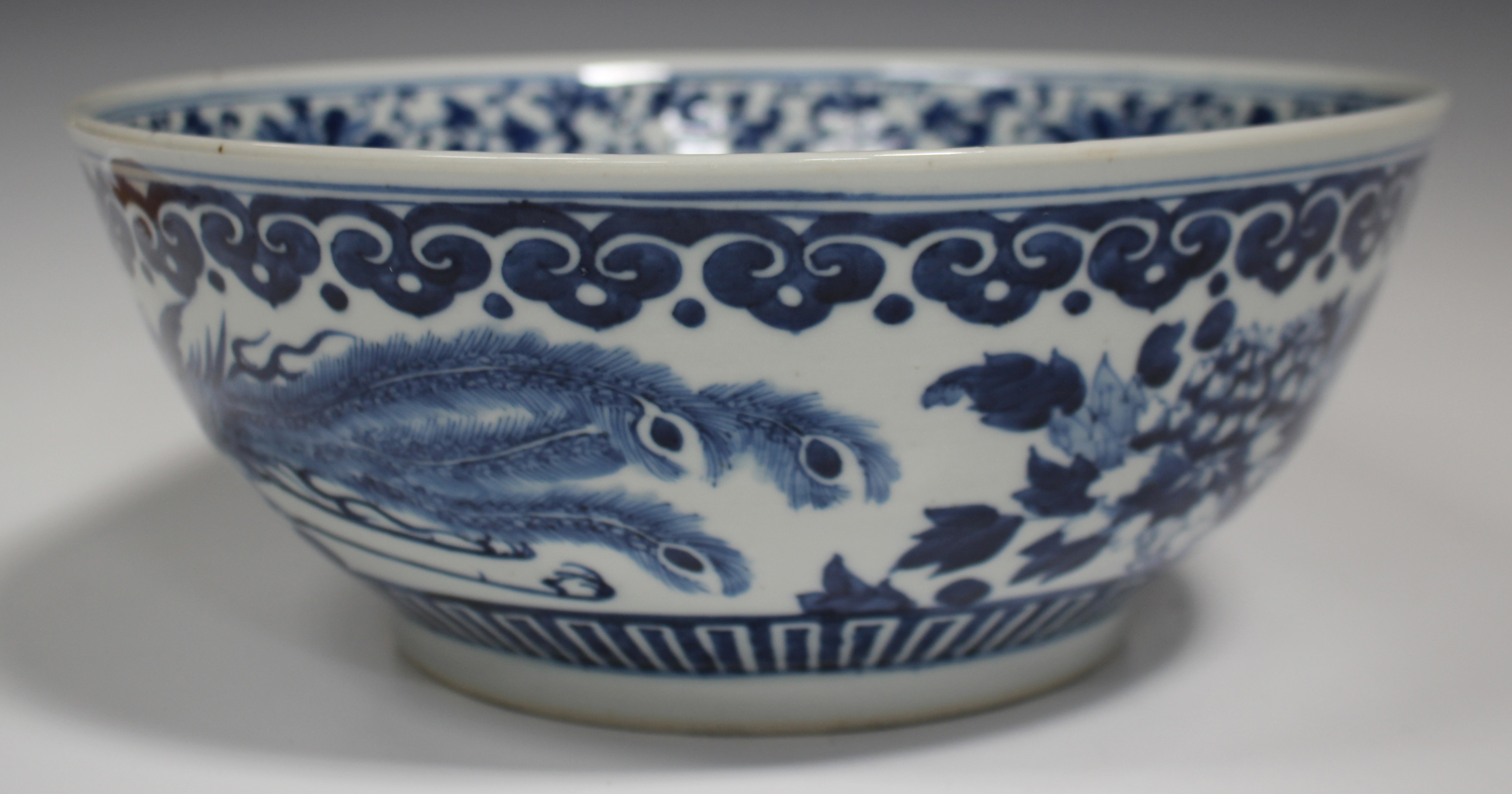 A Chinese blue and white porcelain punch bowl, late 19th century, the exterior painted with a pair - Image 5 of 6