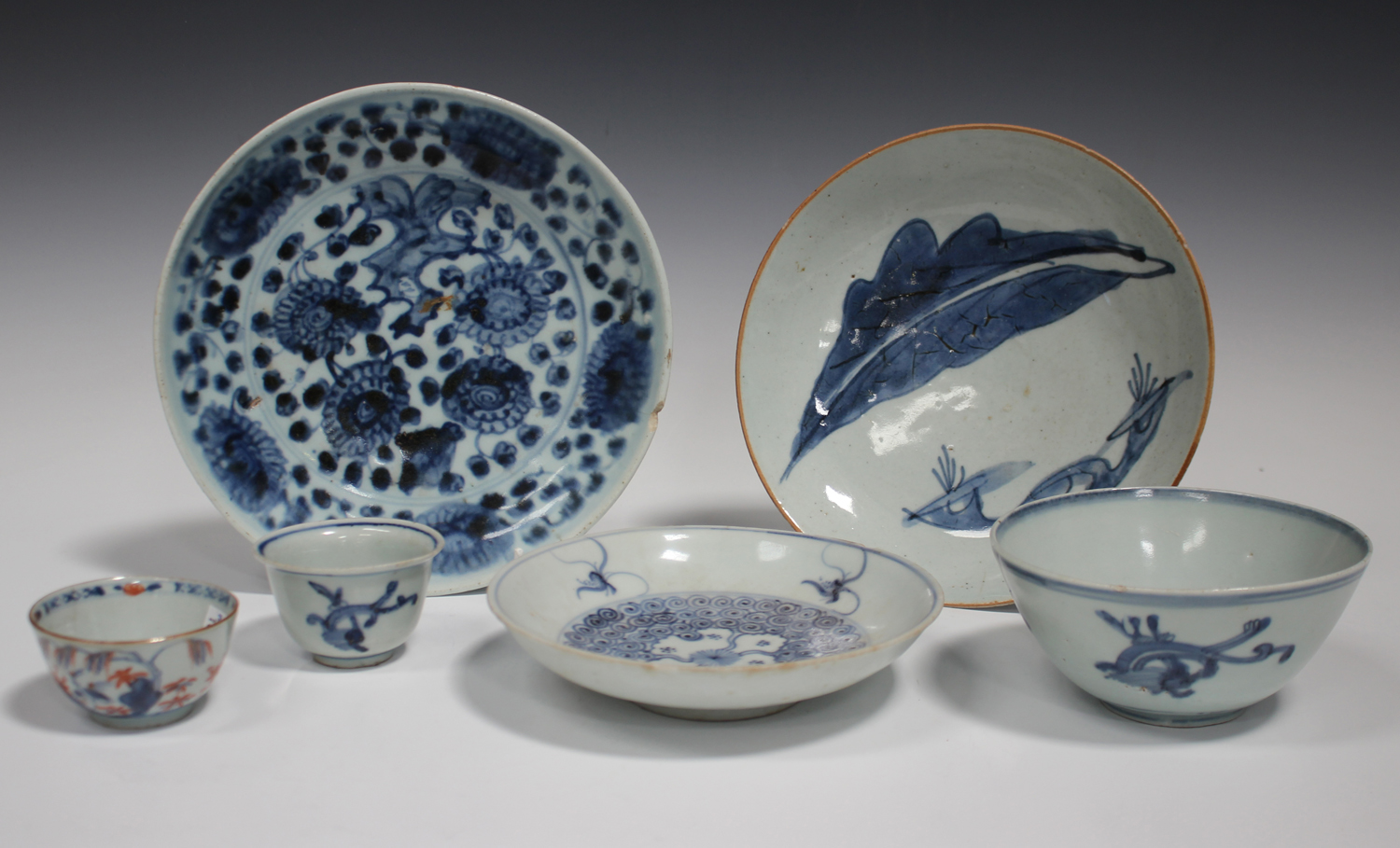A small group of Chinese blue and white porcelain, Ming dynasty, comprising a circular dish, painted