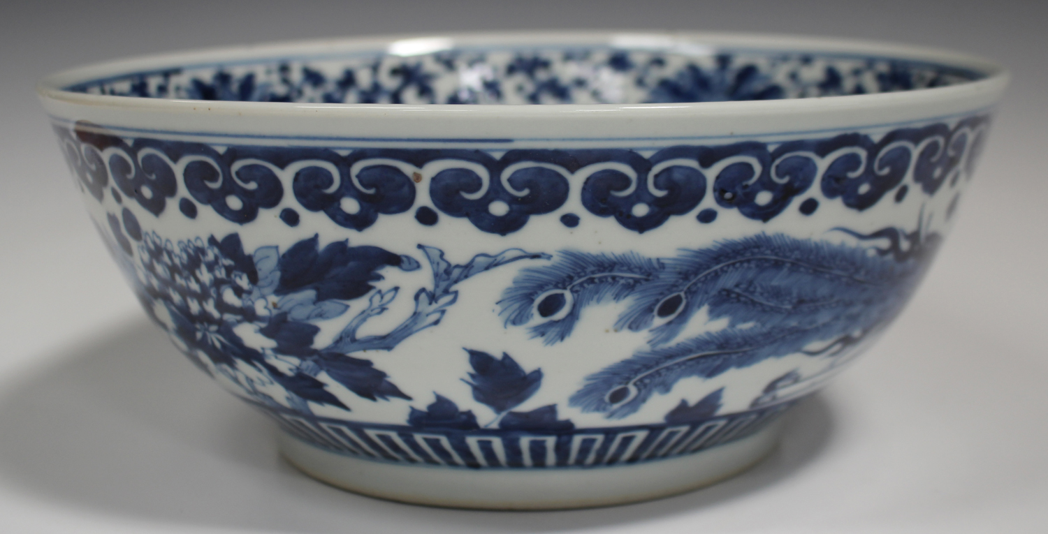 A Chinese blue and white porcelain punch bowl, late 19th century, the exterior painted with a pair - Image 4 of 6