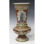 A Villeroy & Boch Mettlach stoneware vase, circa 1900, the flared neck decorated with opposing