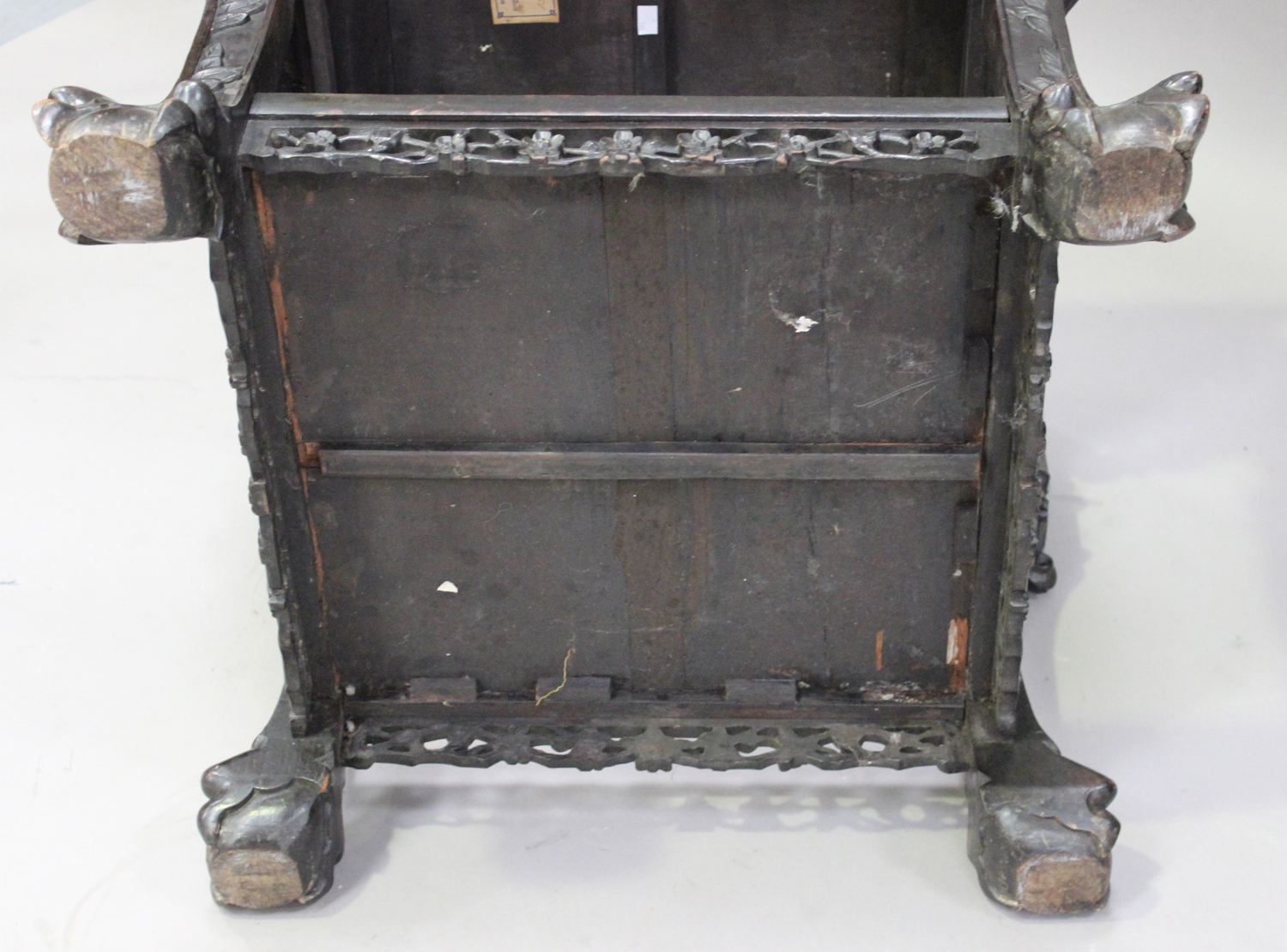 A Chinese carved hardwood stand, late 19th/early 20th century, the square panelled top with a carved - Image 7 of 7