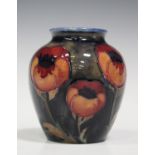 A Moorcroft pottery Big Poppy pattern vase, circa 1926-28, of high shouldered form, impressed