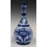 A Macintyre Moorcroft Florian Ware bottle vase, circa 1898-1902, decorated in shades of blue with
