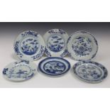 A group of six Chinese blue and white export porcelain plates, Kangxi period and later, painted with