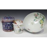 A Chinese famille rose porcelain cylindrical jar and cover, modern, painted with lotus, tendrils and