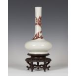 A Chinese underglaze red decorated porcelain bottle vase, mark of Kangxi but possibly late Qing