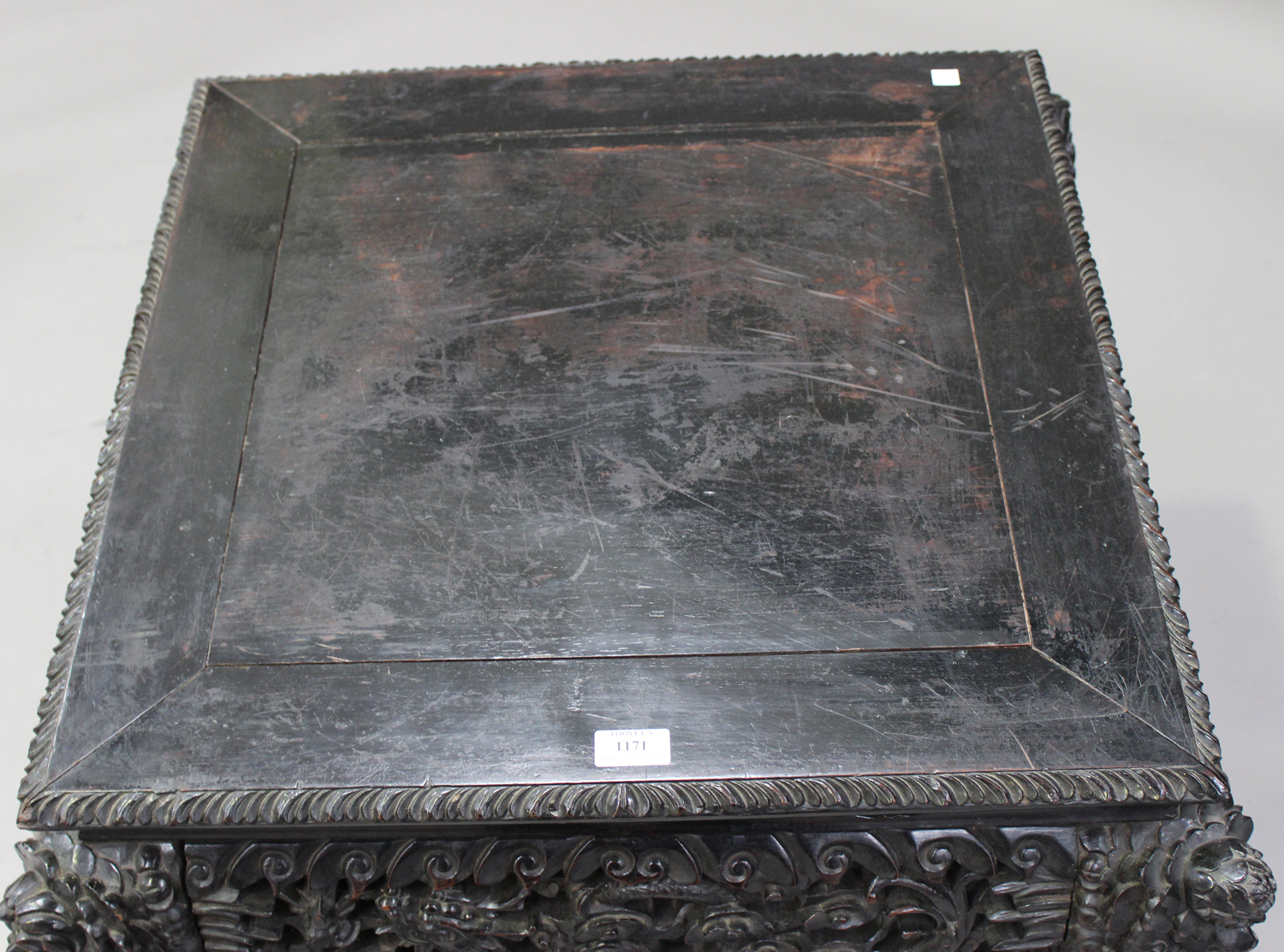 A Chinese carved hardwood stand, late 19th/early 20th century, the square panelled top with a carved - Image 3 of 7