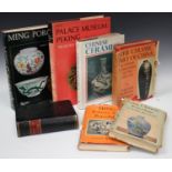A collection of Asian art reference books, including 'Later Chinese Porcelain' and 'Ming Pottery and