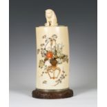 A Japanese Shibayama inlaid ivory tusk vase and cover with integral carved wood stand, Meiji period,