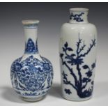 A Chinese blue and white porcelain bottle vase, Kangxi period, the globular body with flared