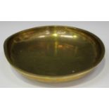 A Chinese gilt bronze circular bowl, mark of Qianlong but probably later Qing dynasty, of shallow
