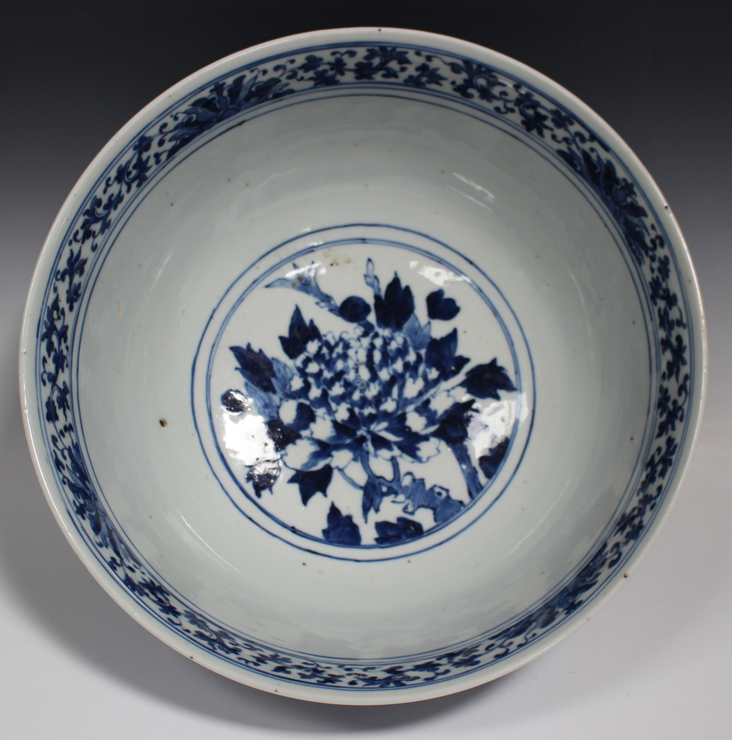 A Chinese blue and white porcelain punch bowl, late 19th century, the exterior painted with a pair - Image 3 of 6