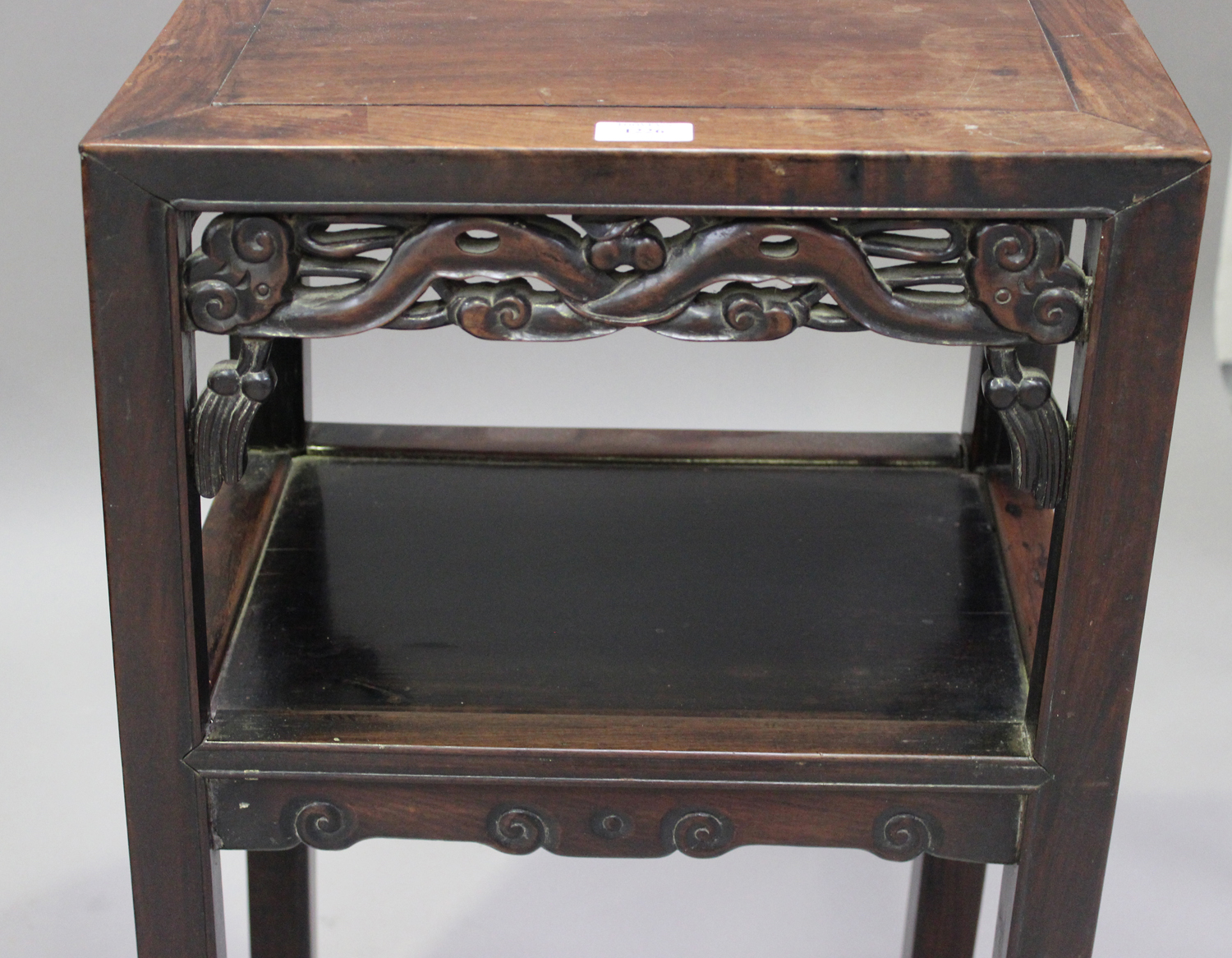 A pair of Chinese hardwood two-tier stands, late 19th century, each rectangular panelled top above a - Image 4 of 8