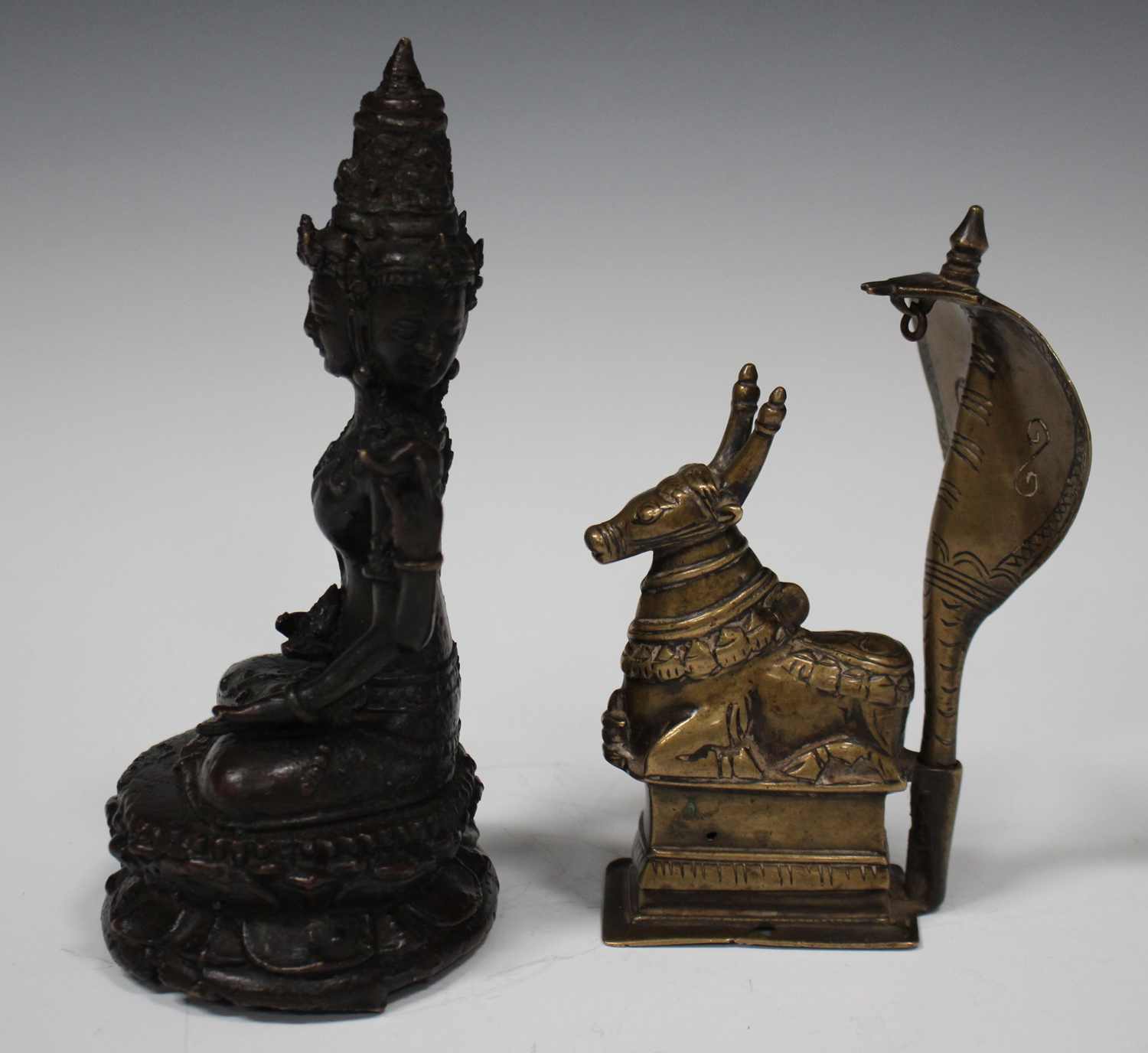 An Indian brass figure group of the Nandi bull with detachable naga (cobra) hood, 19th century, on a - Image 4 of 4