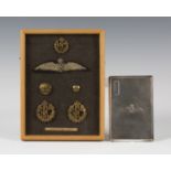 A small group of Royal Flying Corps badges, buttons and insignia, including cloth wings and two