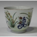 A Chinese porcelain tea bowl, mark of Daoguang and possibly of the period, of 'U' shape, the