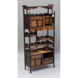 A Japanese parquetry inlaid display side cabinet, Meiji period, fitted with an arrangement of