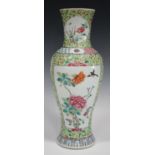 A Chinese famille rose porcelain vase, mid-19th century, of slender baluster form, painted with