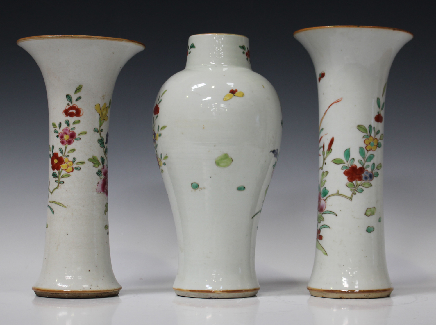 A Chinese famille rose export porcelain garniture of three vases, Qianlong period, comprising a pair - Image 2 of 4