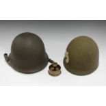 A United States military M1 helmet liner, together with a French M51 helmet, dated 1959, and a