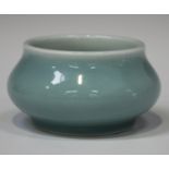 A Chinese clair-de-lune glazed brush washer, mark of Kangxi but later, of circular bombé form,