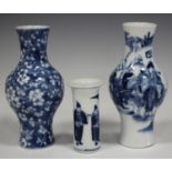 A group of three Chinese blue and white porcelain vases, comprising two baluster vases, marks of