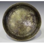 A South-east Asian patinated bronze circular dish, 19th/20th century, of turned circular form with