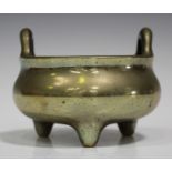 A Chinese polished bronze bombé censer, mark of Xuande but late Qing dynasty, of low-bellied