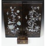 A pair of Chinese mother-of-pearl inlaid lacquer rectangular panels, 20th century, each decorated