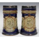 A pair of Royal Doulton Nelson Centenary commemorative stoneware beakers, early 20th century,