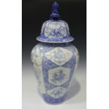 A Japanese Arita blue and white porcelain jar and domed cover with Buddhistic lion finial, Meiji