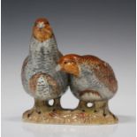 A pair of Beswick partridges, model No. 2064, height 14.5cm.Buyer’s Premium 29.4% (including VAT @
