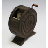 A late 19th/early 20th century French Biofix flick book turner, the cylindrical pressed metal casing