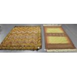 A Turkish flatweave rug, the yellow twin compartment field within a geometric border, 210cm x 110cm,