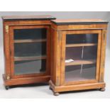 Two late Victorian walnut pier cabinets with inlaid decoration, raised on turned legs, widths 75cm.
