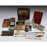 A group of mixed collectors' items, including a Burgess's Anchovy Paste pot lid, a set of bone and