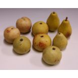 A group of 20th century Italian carved and stained marble models of fruit, including three pears,