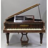 A late Victorian rosewood cased boudoir grand piano by Collard & Collard, London, raised on