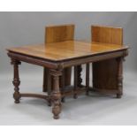 A late 19th/early 20th century French oak extending dining table, the rectangular moulded top with