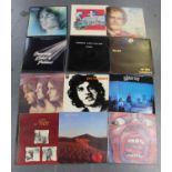 A collection of LP records, mainly rock, pop and progressive, including albums by King Crimson,