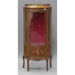 A late 19th/early 20th century French kingwood and gilt metal mounted vitrine, the single glazed