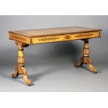 A Regency bird's eye maple and foliate inlaid library table, in the manner of Gillows of