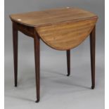 A George III mahogany oval Pembroke table with boxwood stringing, fitted with a drawer, raised on